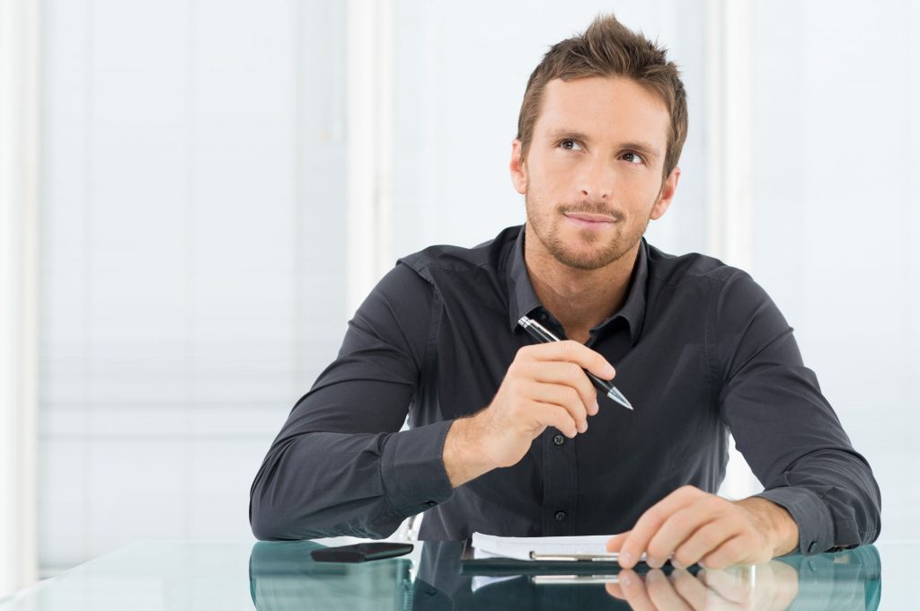 Young Man Studying Joint Tenancy and Land Ownership